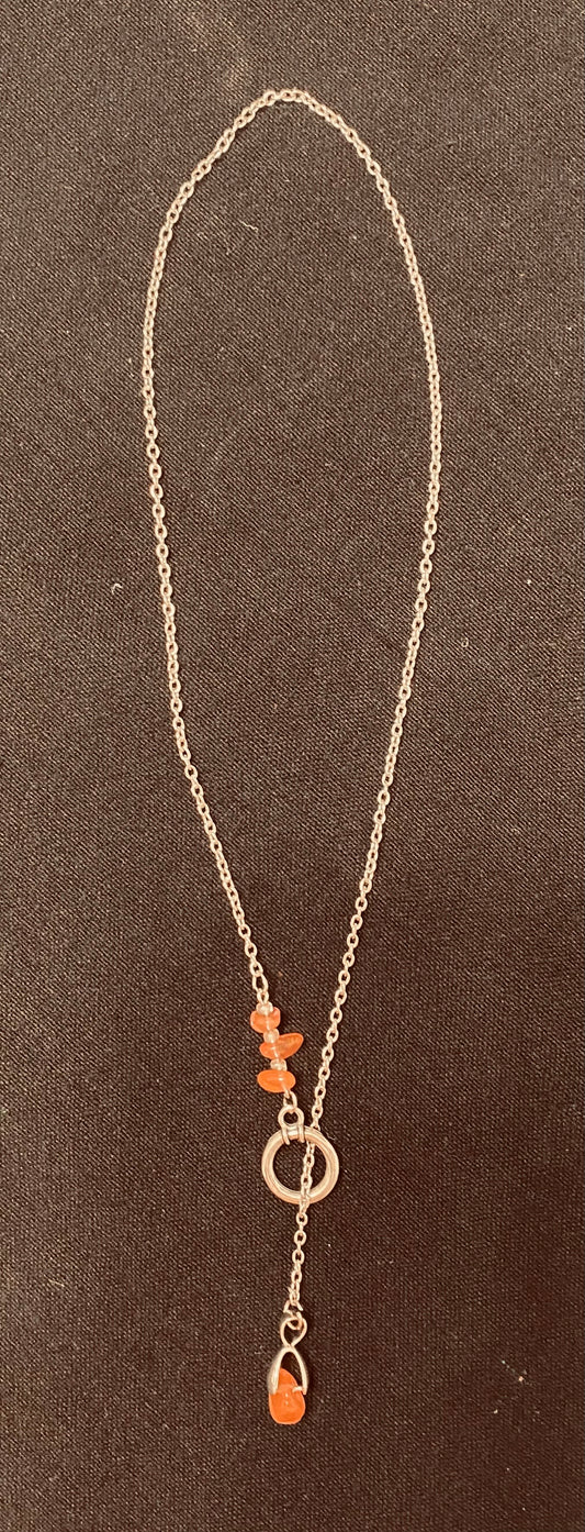 Lariat Necklace: Silver with melting pink/peach crystals